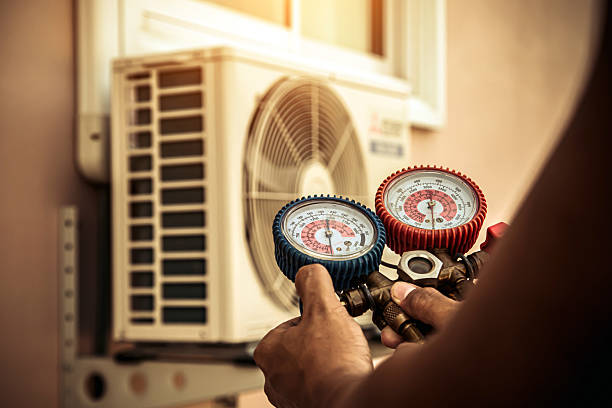 Professional Heat Pump Repair technician working in Milton, NH